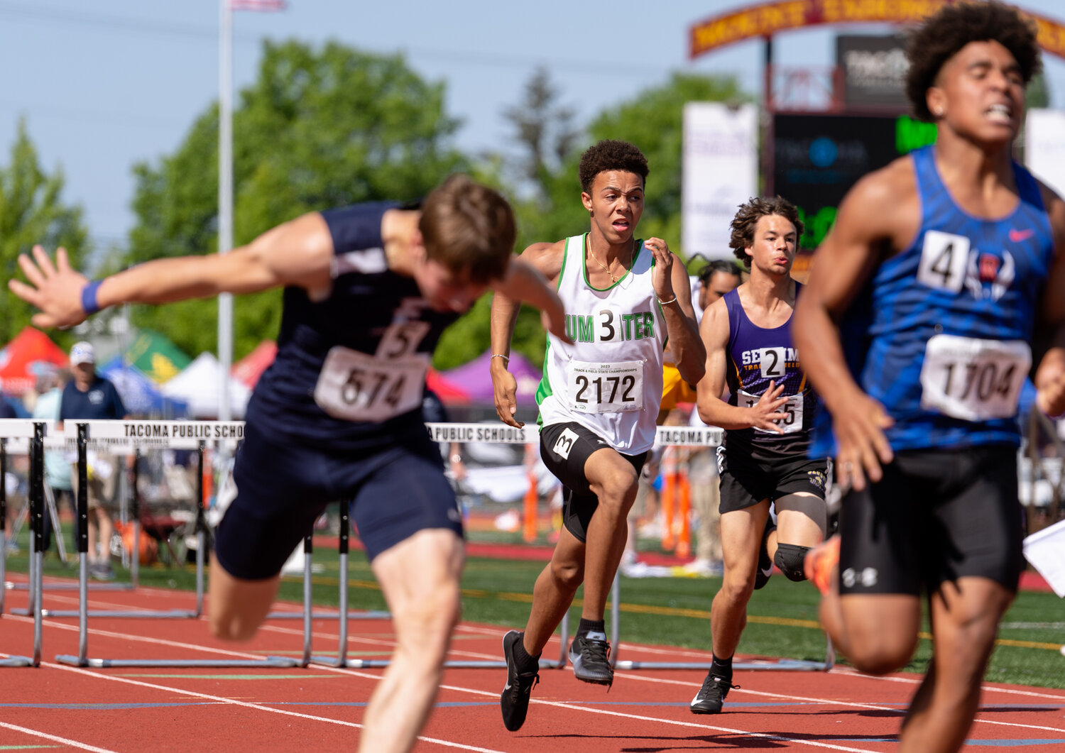 Tumwater’s Jayden Thomas strides toward the finish in a preliminary race of the 110-meter hurdles at the WIAA 2A/3A/4A State Track and Field Championships on Thursday, May 25, 2023, at Mount Tahoma High School in Tacoma. (Joshua Hart/For The Chronicle)